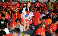 South Korean fans wait for the live broadcast of South Korea's 2010 World Cup second round football match against Uruguay in downtown Seoul on June 26, 2010. South Korea and Uruguay are to meet in a fascinating World Cup last 16 clash that few pundits would have predicted at the start of the tournament.